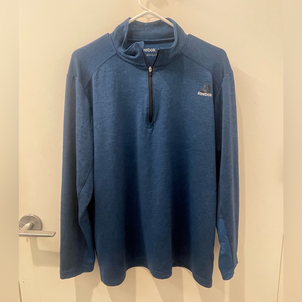 Blue Reebok Light Weight Quarter Zip.